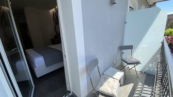 Chambre Deluxe, vue ville | Literie de qualité supérieure, matelas mémoire de forme, minibar