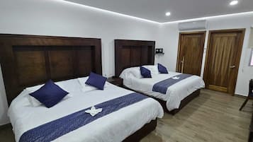 Family Triple Room, Multiple Beds, City View | Select Comfort beds, in-room safe, desk, laptop workspace