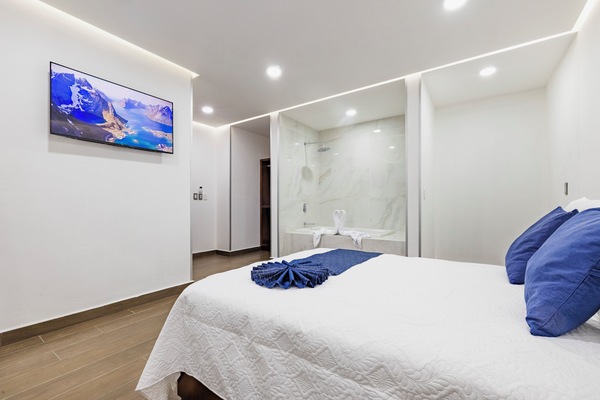 Habitación Elite | Camas Select Comfort y caja de seguridad en la habitación