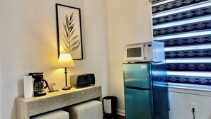 A compact kitchenette with a microwave, toaster, and refrigerator. - Magnolia Suite Vacation Home -Private Entry, Old Canton N. Jackson (Jackson)