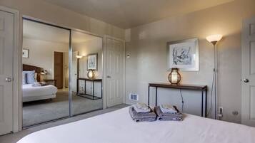 1 bedroom, desk, iron/ironing board, travel crib