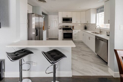 8673 W 63rd Pl · Golfers Dream! Sweet NW location.