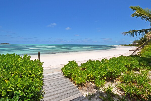 On the beach, sun-loungers, beach towels