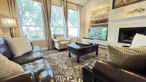 Smart TV, fireplace, DVD player, books