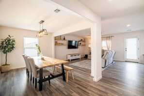 Dining room open to living room - 4BR Casa Grande Home | Fast WiFi, Grill + Sleeps 8 (Casa Grande)