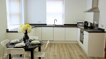 Apartment | Private kitchen | Fridge, microwave, oven, stovetop