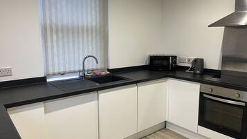 Apartment | Private kitchen | Fridge, microwave, oven, stovetop