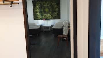 Blackout drapes, iron/ironing board, bed sheets