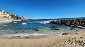 On the beach, sun-loungers, beach towels