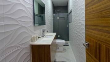 Hair dryer, towels, soap, shampoo