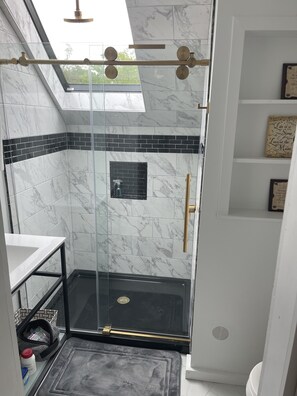 Shower, towels, soap, shampoo