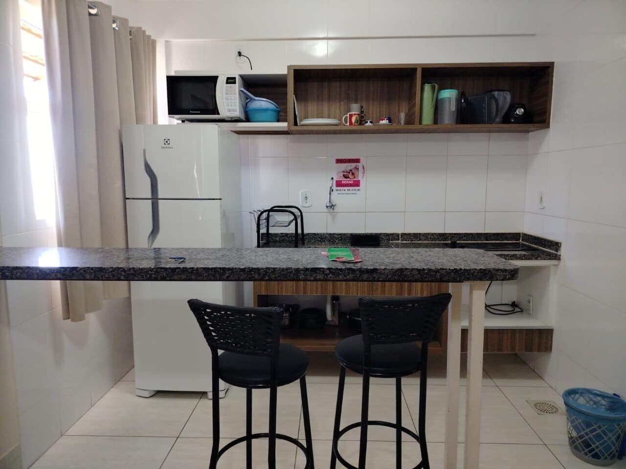 Basic Apartment | Private kitchen | Microwave, cookware/dishes/utensils