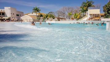 14 outdoor pools, pool umbrellas, pool loungers