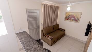 Apartment | Living area | 32-inch LED TV with cable channels