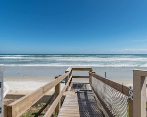 On the beach, sun-loungers, beach towels