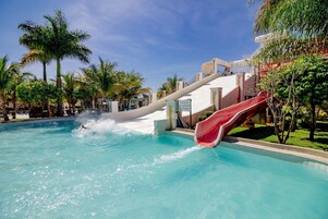 12 outdoor pools, pool umbrellas, lifeguards on site