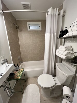 Hair dryer, towels, soap, shampoo