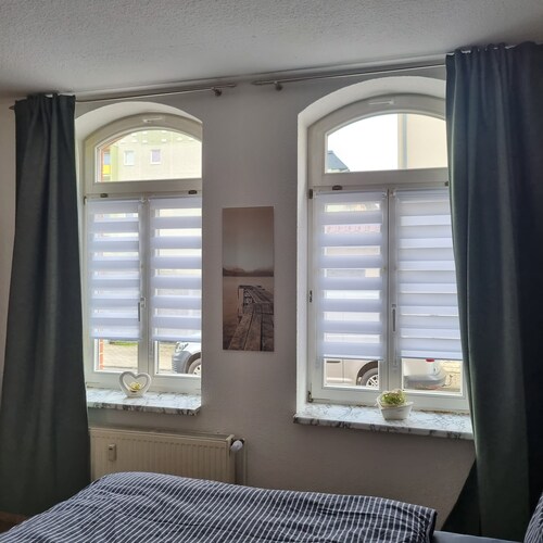 Ferienwohnung 'Lehn Dich Zurück' mit Privatem Garten und WLAN