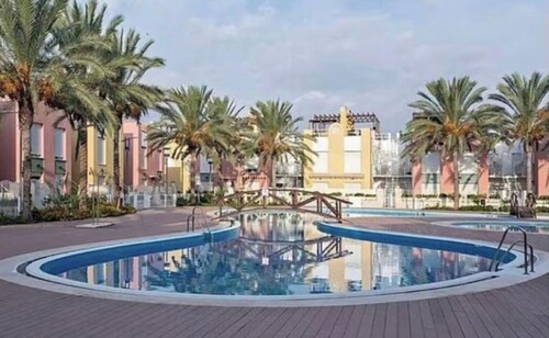 Apartment 'Laguna Beach Vera' with Shared Pool and Private Hot Tub