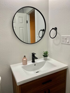 Hair dryer, towels, soap, toilet paper