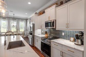 Fridge, microwave, oven, stovetop - Sunny getaway with 2 golf carts, patio, grill, pool,  & tennis (Miramar Beach)