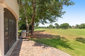 Terrace/patio - Sunny getaway with 2 golf carts, patio, grill, pool,  & tennis (Miramar Beach)