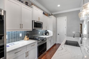 Fridge, microwave, oven, stovetop - Sunny getaway with 2 golf carts, patio, grill, pool,  & tennis (Miramar Beach)