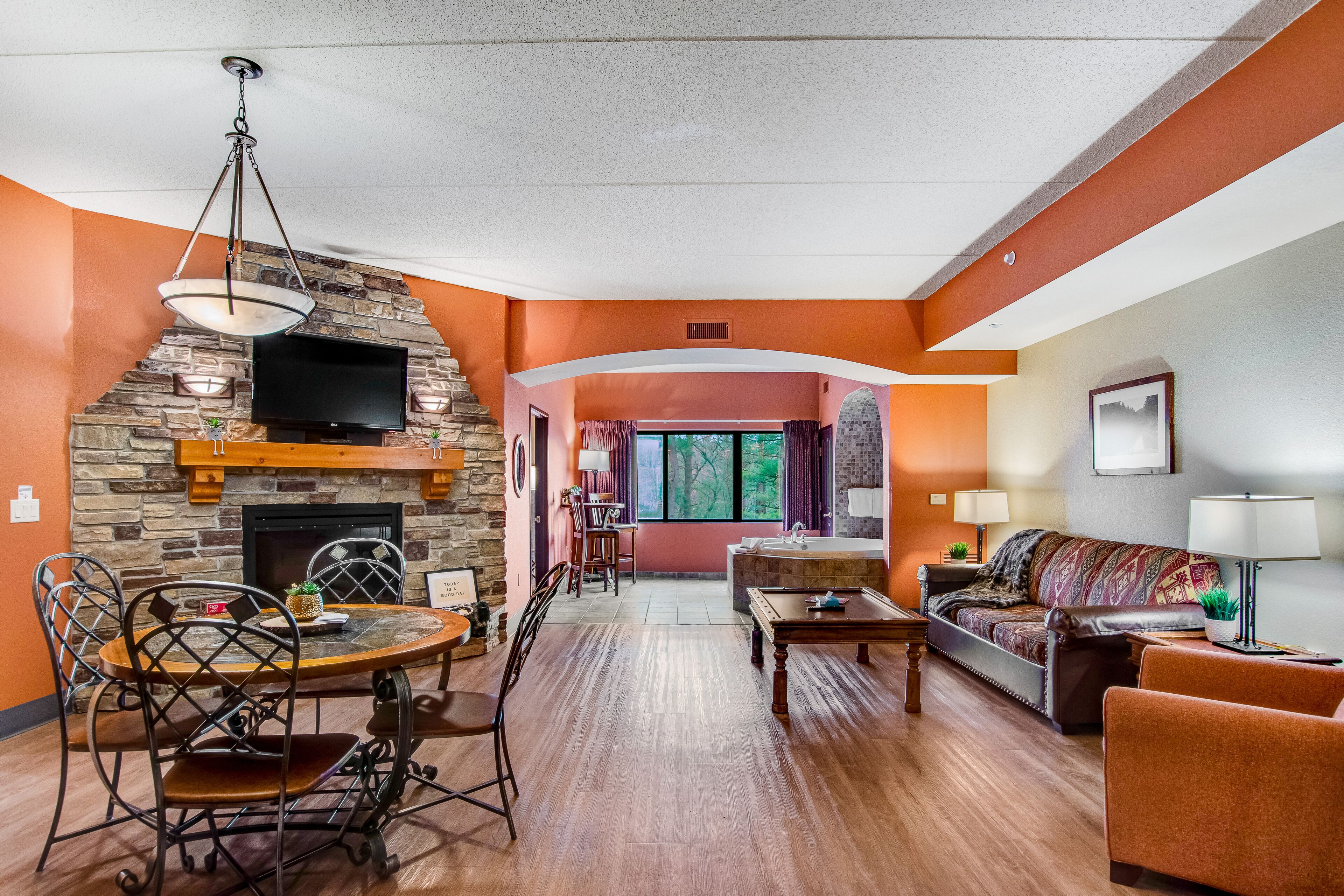 Comfortable 2nd-floor condo with two fireplaces, central AC, & jetted tub