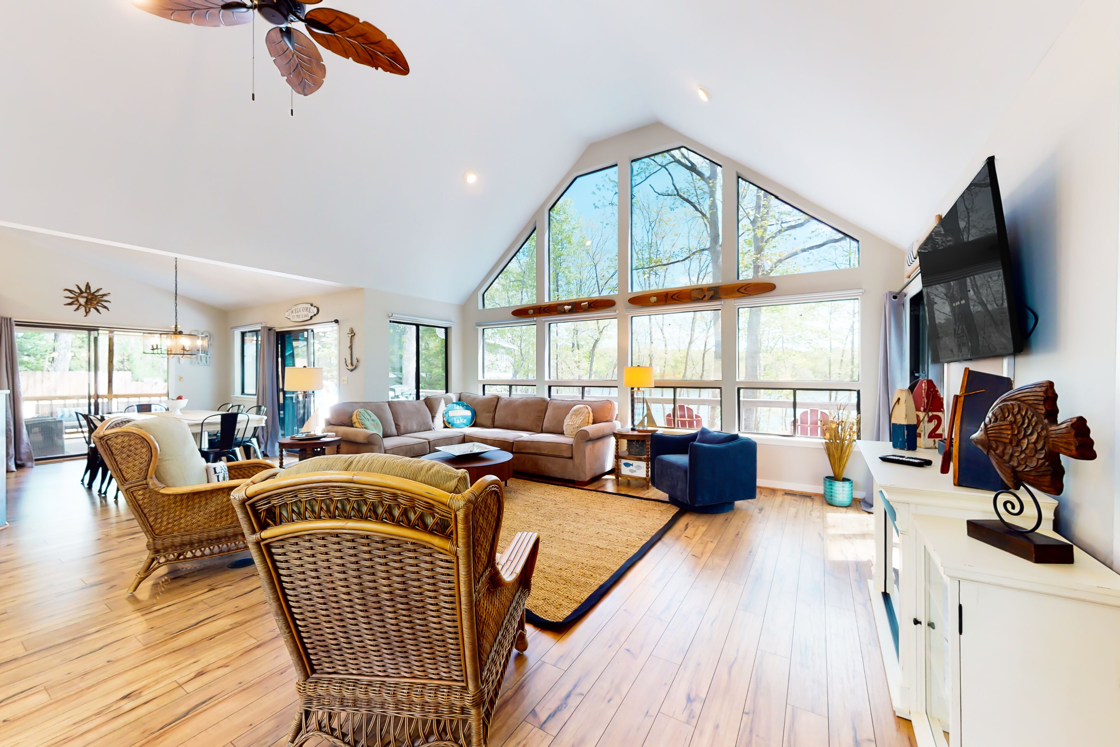 Inviting lakefront home with game room, kayaks, firepit, central AC, & W/D