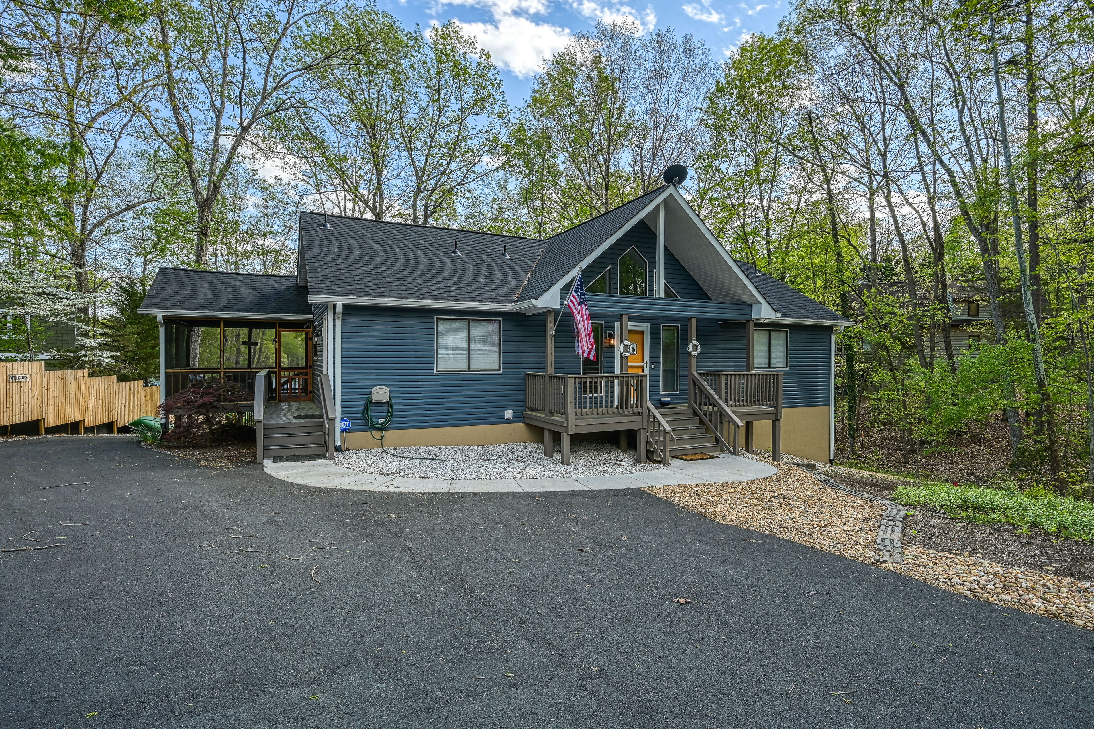 Inviting lakefront home with game room, kayaks, firepit, central AC, & W/D