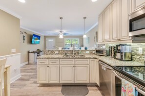 Fridge, microwave, stovetop, dishwasher - Cozy Home With Fenced In Back Yard and Firepit! (Oak Island)