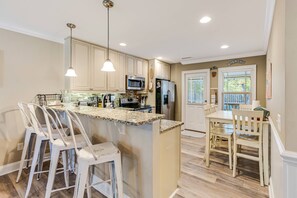 Fridge, microwave, stovetop, dishwasher - Cozy Home With Fenced In Back Yard and Firepit! (Oak Island)