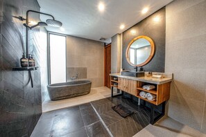 Bathtub, hair dryer, towels