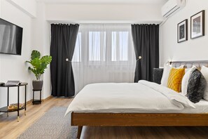 Exclusive Apartment | 1 bedroom, blackout drapes, iron/ironing board, free WiFi
