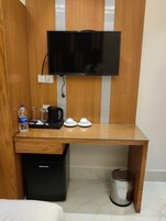 Habitación individual Deluxe | Televisión