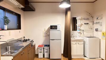 City House | Private kitchen | Full-size fridge, microwave, stovetop, electric kettle