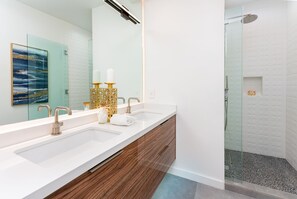 Shower, towels, soap, toilet paper