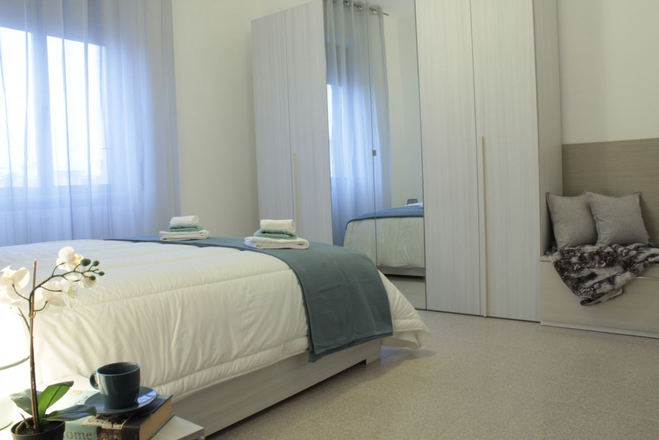 2 slaapkamers, een strijkplank/strijkijzer, beddengoed