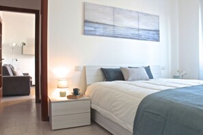 2 slaapkamers, een strijkplank/strijkijzer, beddengoed