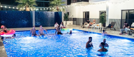 Outdoor pool, open 7:00 AM to 10:00 PM, sun loungers