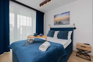 1 slaapkamer, een strijkplank/strijkijzer, wifi, beddengoed