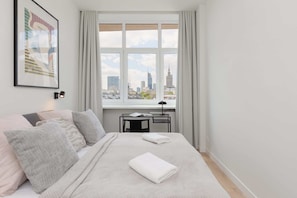 2 habitaciones, tabla de planchar con plancha, wifi y ropa de cama 