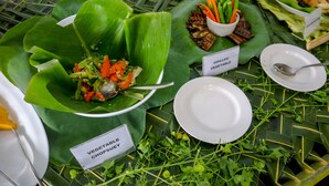 A buffet table with various dishes labeled, including grilled vegetable and vegetable chips. - HOTEL ACRUS (Galle)