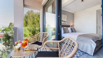 Deluxe Room, Terrace, Sea View | 1 bedroom, memory foam beds, minibar, individually decorated