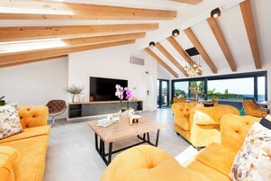Signature Penthouse, 2 Bedrooms, Hot Tub, Sea View | Living area | 90-cm Smart TV with satellite channels, TV