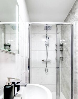 Shower, free toiletries, hair dryer