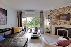 Departamento, 1 habitación, acceso a la alberca | Sala de estar