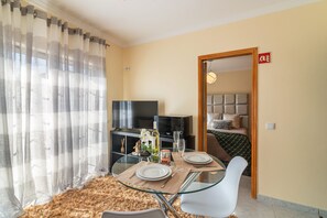 Apartamento, 1 quarto, terraço | Sala de estar