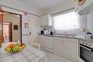 Apartment, 2 Bedrooms, Terrace | Private kitchen | Microwave, oven, coffee/tea maker, electric kettle - Portimão Solar DO VAU With Pool (Portimão)
