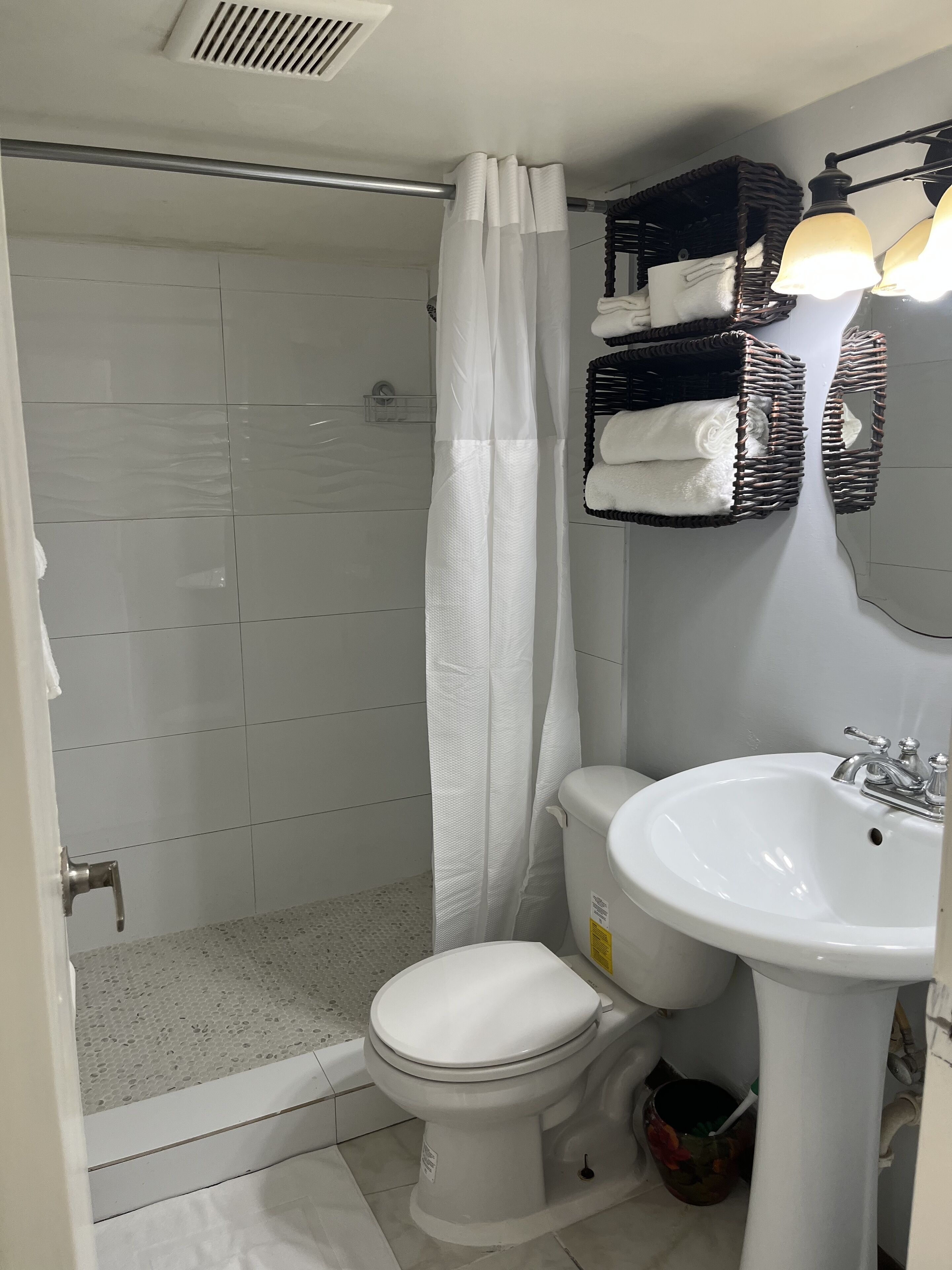 Hair dryer, towels, soap, shampoo